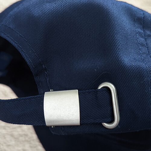 Embroidered Hat White on Navy Closeup Clasp